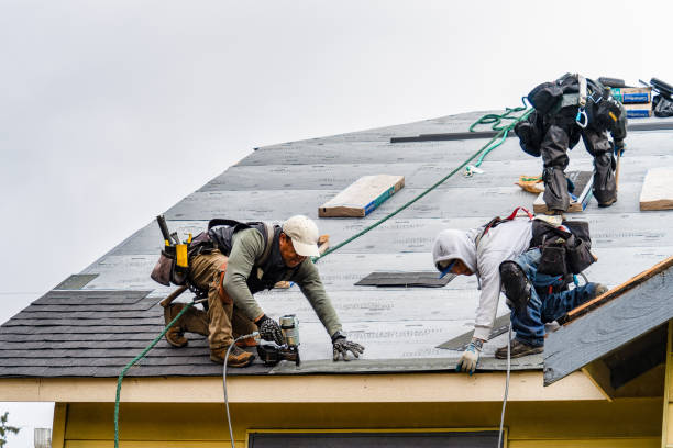 Professional Gutter Installation technician working in Berkley, MA